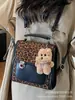 Mochila Estampa de Leopardo Feminina 2025 Nova para Estudante Universitário Viagem Diária Bolsa Escolar Pequena Leve Mochila Feminina para Viagem e Trajeto