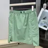 26 nueva falda corta de verano para exteriores estilo montaña, cintura elástica, absorbe la humedad, transpirable, anti-exposición, bolsillo impermeable, ropa de trabajo, línea A