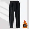 Calça esportiva masculina de alta qualidade, elástica, para outono e inverno, tamanho grande, estilo business, forrada com fleece, resistente a rugas, calça jogger casual de perna reta folgada