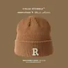 Gorro de lana popular para mujer, invierno 2023, nuevo gorro de punto cálido de moda para mujer, orejeras, gorro frío, moda
