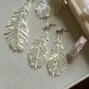 Pendientes de Pluma con Cuentas de Arroz Blanco 2025 Nuevos Pendientes Hermosos con Cuentas Pendientes Literarios para Mujer