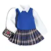 2026 Nuevo Comercio Exterior Producto Transfronterizo Estilo Coreano Chaleco de Punto para Niñas Top de Color Sólido con Cuello Falda Plisada a Cuadros Conjunto de Tres Piezas