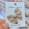 Broches Moda de Nicho Anti-Exposición Accesorios de Corsage para Mujer de Aleación Joyería Versátil Elegante para Cuello Venta al por Mayor Estilo Lujo Ligero