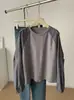 Sudadera de manga larga a rayas con retazos y cuello redondo, diseño estilo coreano para mujer, otoño 2026, manga raglán holgada, top de alta gama