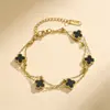 Pulsera exquisita de acero de titanio de 9 mm con trébol de cuatro hojas de doble capa para mujer, no se decolora, nueva moda de doble cara de lujo ligero, versátil y elegante