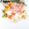 6cm Cabeça de Orquídea Cymbidium Artificial Acessórios de Toque Grampo Lembrança de Casamento Layout de Fundo DIY Arranjo de Flores Fabricante Atacado