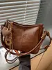 Bolso bandolera para mujer de gran capacidad 2026 nuevo estilo moderno sensación de alta gama bolso retro bolso de hombro único para mujer bolso tipo cubo versátil