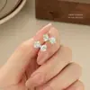 Pendientes de botón de plata 999 con forma de mariposa y nudo de zircón plisado para mujer, pequeños, frescos, dulces, sencillos, para el trabajo, con sensación de alta gama, joyería para orejas