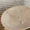 Collar con Colgante de Estrella de Zirconia de Doble Capa de Lujo Ligero Estilo Francés con un Diseño Único, Cadena Exquisita para la Clavícula, Accesorio Versátil y Elegante