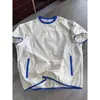 Camiseta deportiva casual de verano de manga corta, tejido ligero, secado rápido, ajuste limpio, cuello redondo, con bolsillo redondo con cremallera de dos tonos