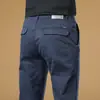 Pantalones Casuales Ajustados Hong Kong Primavera y Otoño 2026 para Hombre Rectos Ajustados Elásticos Versátiles Caqui Pantalones Largos para Hombre