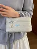 Bolso de mano de cadena de alta gama con patrón de diamante para mujer, nuevo y elegante bolso cuadrado pequeño para el día a día 2026, bolso de hombro y cruzado único y versátil