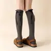 Calcetines gruesos y cálidos de cachemira hasta la pantorrilla para mujer, con diseño de lazo y cinta, de longitud hasta la rodilla, perfectos para combinar con botas, creando un look estilizado y versátil