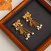 Nuevos pendientes de verano de estilo chino fresco, pendientes de nicho con lazo elegante y dulce, joyería de ágata y perla de agua dulce.