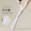 Meias de seda primavera e verão finas femininas novas meias longas de tubo até o joelho meias de seda anti-gancho de cor sólida sexy slim jk meias de panturrilha atacado