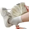 Meias brancas para mulheres, outono e inverno, meias de cano médio com bolinhas, meias japonesas com babados, acabamento em renda, listras finas, versáteis, meias longas de algodão penteado