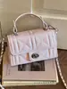 Elegante y sencillo bolso Kelly estilo francés para mujer, nuevo bolso versátil 2026 para hombro y cruzado, adecuado para ir al trabajo y uso casual, moderno bolso pequeño cuadrado