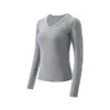 Camiseta lisa de venta directa de fábrica para mujer, hombro normal, cuello en V, corte ajustado, adelgazante, manga larga, nuevo top básico versátil para primavera/otoño