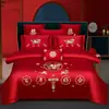 Juego de ropa de cama de lujo estilo chino, hecho de algodón 100% de fibra larga, un juego de cuatro piezas que incluye una sábana y una funda de edredón de algodón puro rojo, perfecto para la alcoba de una recién casada.