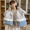 Mochila escolar transfronteriza nueva de alto valor para niñas, mochila de retazos de nicho para estudiantes, bolsa de doble hombro ligera de gran capacidad para estudiantes de secundaria y preparatoria