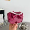 Primavera 2026 Nuevo Mini Lindo Lazo Elegante Versátil Moda Cadena de Perlas Bolso de Hombro Cruzado Transfronterizo