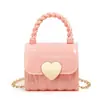2023 Nuevo bolso mini de gelatina portátil con cierre de corazón en relieve de diamante bolso pequeño casual boca sobre rojo