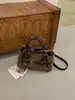 Bolso de Mano de Nicho Estilo Coreano Nuevo para Mujer Otoño/Invierno Retro Súper Popular Bolso de Viaje Bolso Cruzado de Hombro de Alto Valor