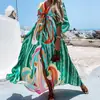 Ropa Femenina Transfronteriza Europea y Americana 2026 Elegante Moda Vestido de Cuello en V Mangas Largas Acampanadas Cintura Alta Suelto Falda Larga Estampada