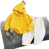 Nuevo Conjunto de Ropa Infantil para Otoño 2026 para Niños y Niñas, Sudadera con Capucha Amarilla de Dibujos Animados Dopamina y Pantalones Rectos