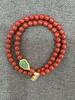Venta al por mayor de fábrica pulsera de un solo círculo imitación cinabrio étnico hebilla de paz valiente colgante de múltiples estilos pulsera de cinabrio exquisita