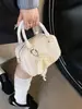 Bolso tipo almohada de moda casual para mujer, bolso cruzado simple y versátil, nuevo bolso de hombro de color liso para la primavera 2026