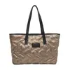Bolsa de gran capacidad para chaqueta de plumón para mujer 2025 Nueva Otoño e Invierno Versátil Ins Nicho Bolso de mano Bolso tote de moda