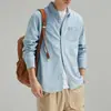 Camisa de mezclilla casual de algodón puro para hombre, nuevo estilo primavera y otoño, versátil y de alta gama, camisa de trabajo, top delgado holgado estilo japonés