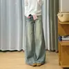 Diseño de pierna ancha pantalones acampanados rotos y desgastados para mujer estilo callejero americano adelgazantes de cintura alta jeans de microcampana modernos