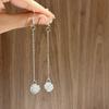 Pendientes de plata S925 con diseño avanzado de borlas largas huecas y redondas de Corea del Sur con personalidad de nicho y todo a juego