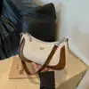 Bolsa de Mão Tote Jeans Retrô Feminina Verão 2026 Nova Pequena de Nicho Popular Estilosa com Textura sob o Braço Transversal