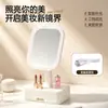 Espejo de escritorio para maquillaje, espejo cosmético LED, plegable y portátil, se puede apoyar en una mesa, con luces para iluminación suplementaria, espejo de oficina