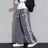 Pantalones de rayas de marca de moda para primavera y otoño para hombre, estilo americano, corte holgado, fluidos, pantalones deportivos casuales, de pierna recta