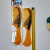 Peine para el cabello con imitación de tendón de res M13 21cm color mixto plástico amarillo para el hogar peine 1 yuan 2 yuanes suministro al por mayor artículos pequeños