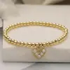 Pulsera de Brazalete de Cobre con Perlas de Cobre Versátil de Nicho, Pulsera con Colgante de Corazón de Circonio Chapado en Oro de 18 Quilates, Best-Seller Transfronterizo de Amazon Aogu