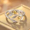 Anillo abierto de rama de color contrastante oro y plata, único y sofisticado, para mujer, estilo bosque, simple y moderno, joyería de anillo versátil al por mayor