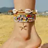 Tobillera trenzada con cuentas de concha estilo resort bohemio transfronterizo Tobillera de cuentas de arroz con estrella de mar estilo playa Juego de siete piezas