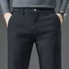 Calças casuais de outono para homens, cintura elástica, novo estilo 2026, moda masculina slim-fit de perna reta para negócios, calças compridas da moda para outono e inverno