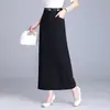 Falda midi lisa y elegante de cintura alta para mujer, nueva colección otoño 2026, falda larga elegante y estilizada con abertura trasera y un diseño que realza la figura