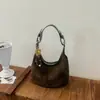 Bolso de axila de alta gama transfronterizo para mujer, nuevo bolso de mano versátil de moda otoño e invierno, bolso de hombro de ante para el trabajo, moderno
