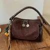 Bolso de mujer retro esmerilado de moda 2026 nuevo bolso cruzado versátil de moda para el trabajo bolso de mano otoño e invierno bolso cuadrado pequeño