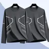 Camiseta casual versátil de manga larga para hombre para otoño, cuello redondo, color liso moderno, cómoda, transpirable y de corte holgado.