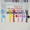 Nueva serie de colores verano gelatina cadena acrílica corazón colgante funda protectora para airpods bolsa llavero cadena colgante