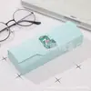Fabricantes de estuches para gafas al por mayor moda lindos para estudiantes hombres y mujeres estuche para gafas de miopía caja de embalaje con logotipo hecho a mano al por mayor