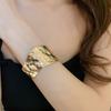 Pulsera de metal exagerada explosiva de gran venta transfronteriza europea y americana, anillo de brazo hueco de nicho, joyería de temperamento de alta gama para mujer, venta al por mayor